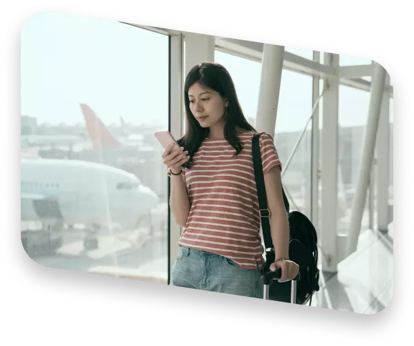 Woman using indoor navigation app on smartphone